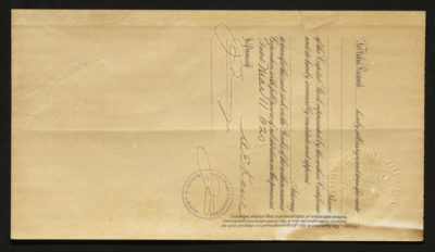 Backside shows legal language with dates and signatures, an ink stamp, and an embossed seal.