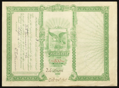 Backside shows legal language with dates, amounts, signatures, and borders in black, green and red ink