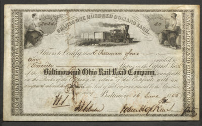 This stock certificate (No. 20261) represents 20 shares valued at $100 each for the Baltimore and Ohio Railroad Company. Two vignettes in the top corners each feature a woman dressed in a white dress with a blanket draped over her knees. The left woman is sitting on a bushel of wheat and is holding a hand scythe, and the right woman is sitting on several barrels and boxes holding a rapier-looking rod. The center vignette depicts a train with five cars linked and a bridge and several buildings behind it. This certificate also shows the company’s corporate seal and two stamps denoting cancellation (see Translation field for more).