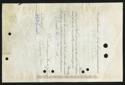 Backside shows legal language, signatures, space for dates and amounts, and small circles punched out