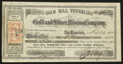 Certificate with black ink shows intricate borders, vignettes with a miner, a red IRS stamp with George Washington, and a company seal